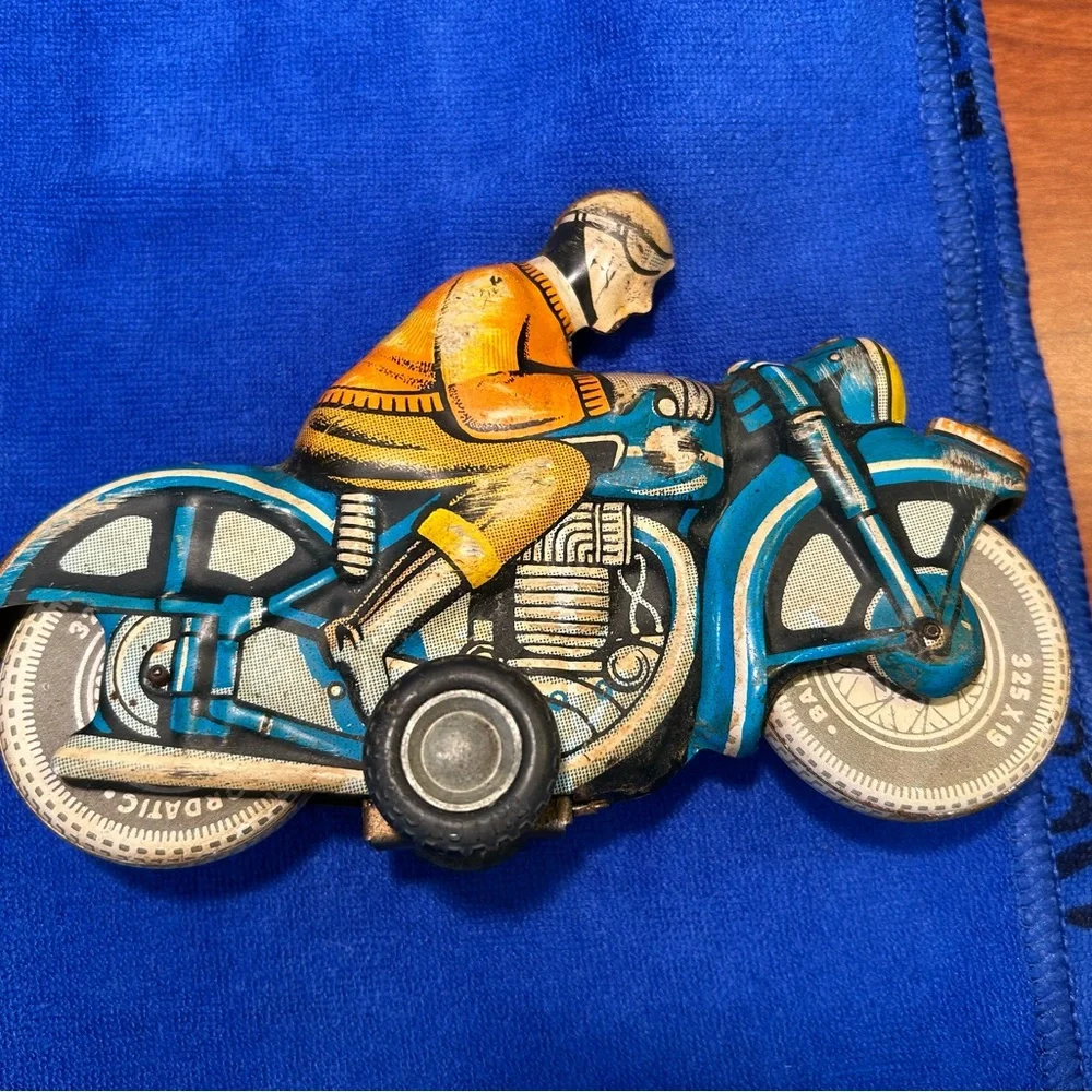 Tin Lithograph Friction Drive Ballon Cordatic toy cycle EN-12-63 Vtg 1950 Era.